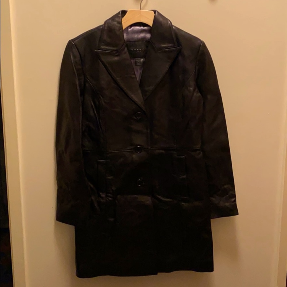 A guess black leather sheepskin jacket.